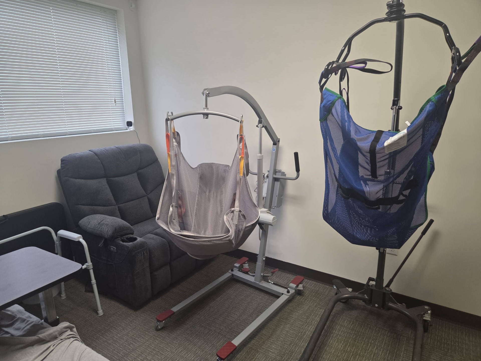 Patient lift and transfer equipment used in caregiver training